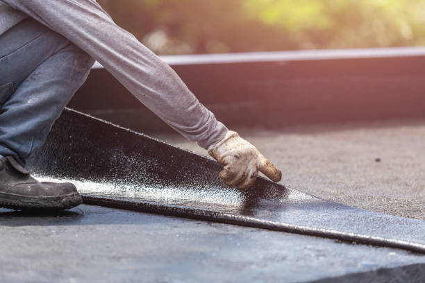 Professional Waterproofing technician working in Iola, WI